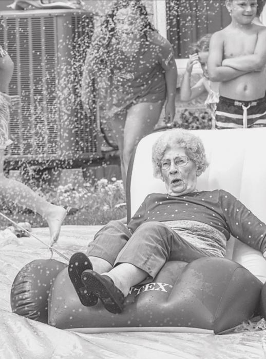 Marilyn Robertson enjoys her trip down the slip n slide!
