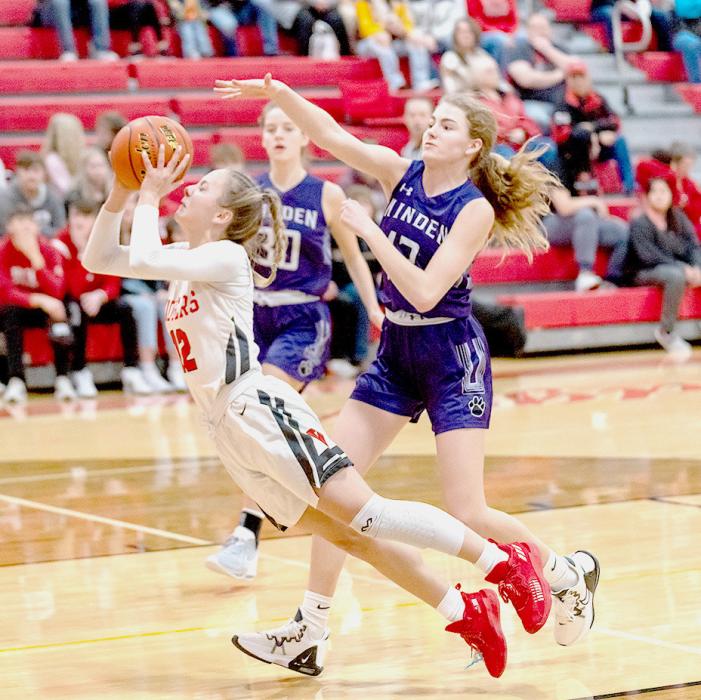 Tacey From #12 goes up for the shot and draws a foul.