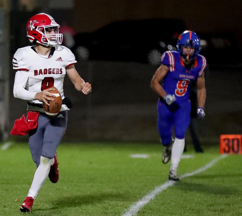 Quarterback Trace Buechle #9 looking for a pass.
