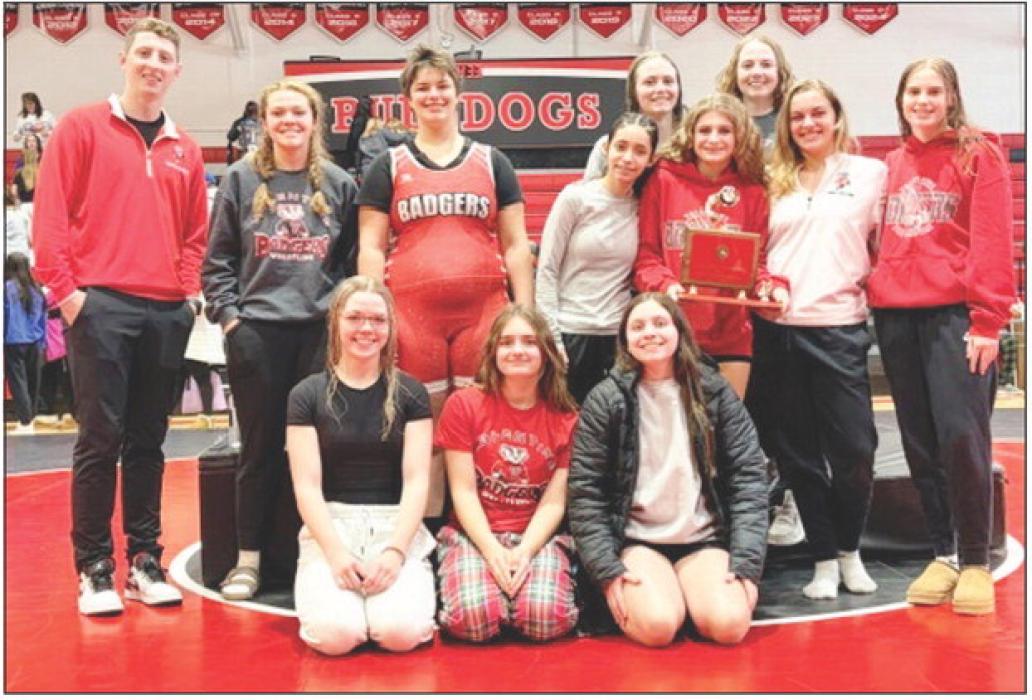 Pictured are the Lady Badger wrestling team who earned their first ever team title for girls wrestling in Valentine. Photo by Lorena Eggert