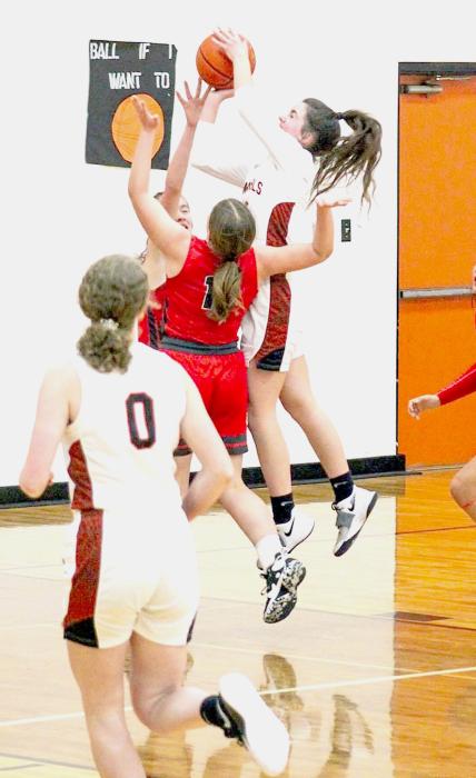 Aubree Johnson putting up a bucket against Valentine. Photo by Shontell Roseberry