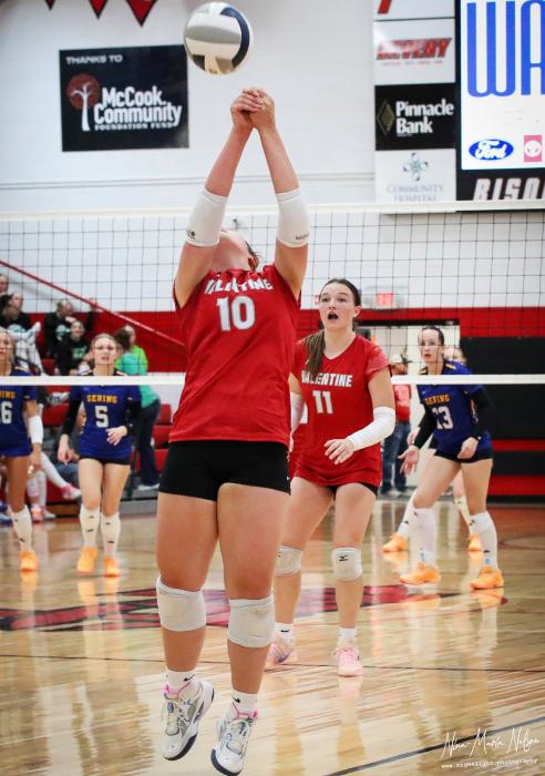 Top, Alex Monroe #10 hitting the ball back to Gering during the Mc Cook Invitational Tournament. Bottom, Rylinn Feeken #9 passing the ball to Devahney Belville #11 against Maywood Hay Center.