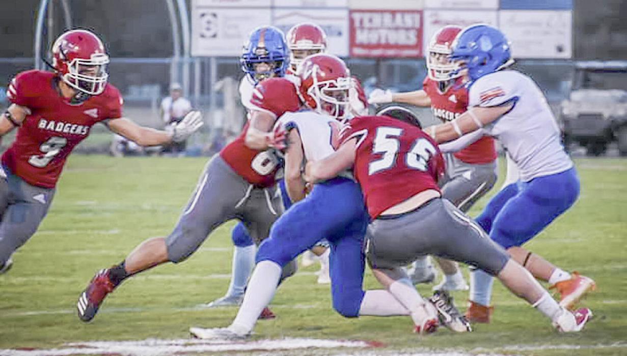 Grant Boes #56 and Traven Fletcher #88 work to take down Gordon-Rushville’s ball carrier, in the Homecoming game held Friday, September 30, 2022. Photos by DeanNa Fowler