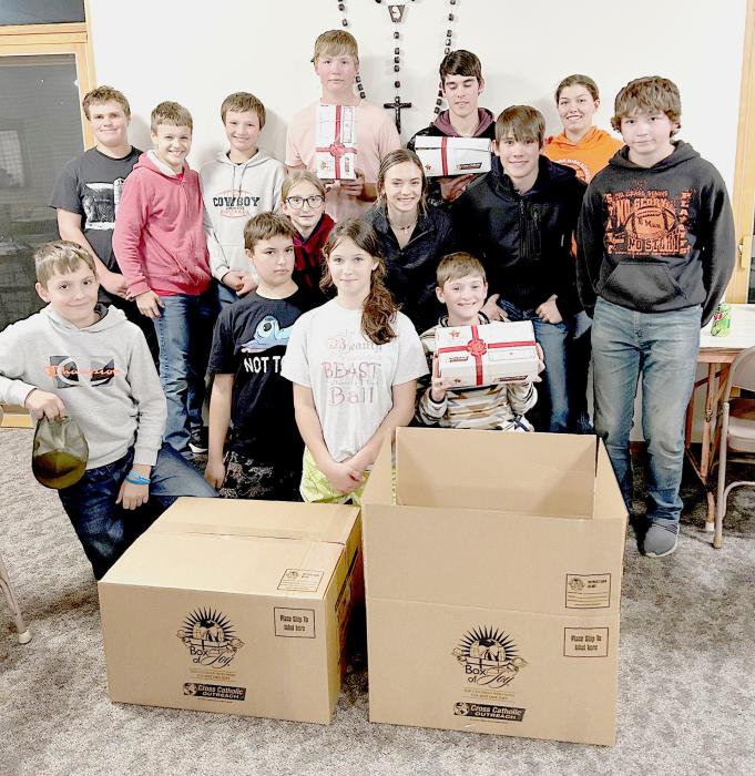 The youth at St. Mary’s Catholic Church in Nenzel stuffed boxes headed to countries where the poorest of poor will receive a Box of Joy.