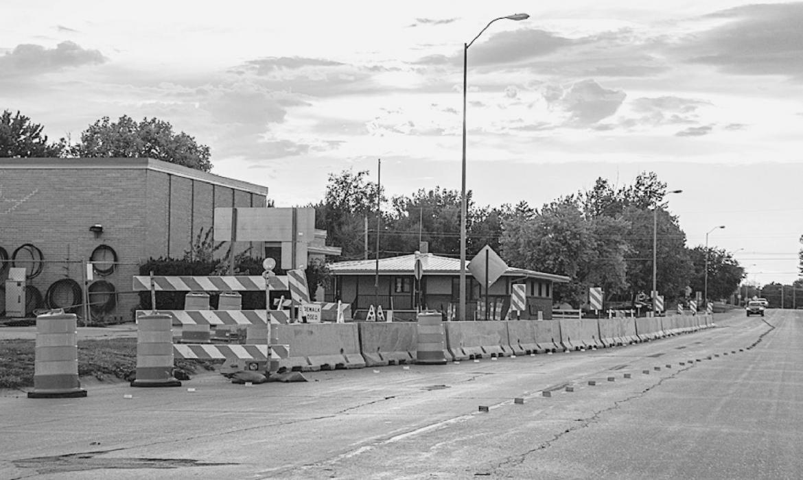 Concrete barriers have been placed at the intersection of Cherry and Fourth Street, left, and at Cherry Street and Highway 20 at right. Local residents will have access through barricades.