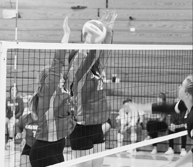 Lindsey Boes going up for a block.
