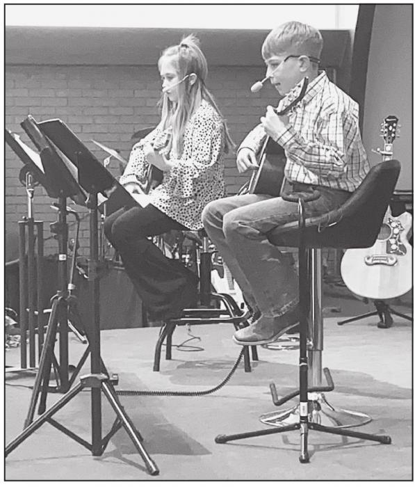 Gage Sandoz and Harley Thorpe performing a duet.