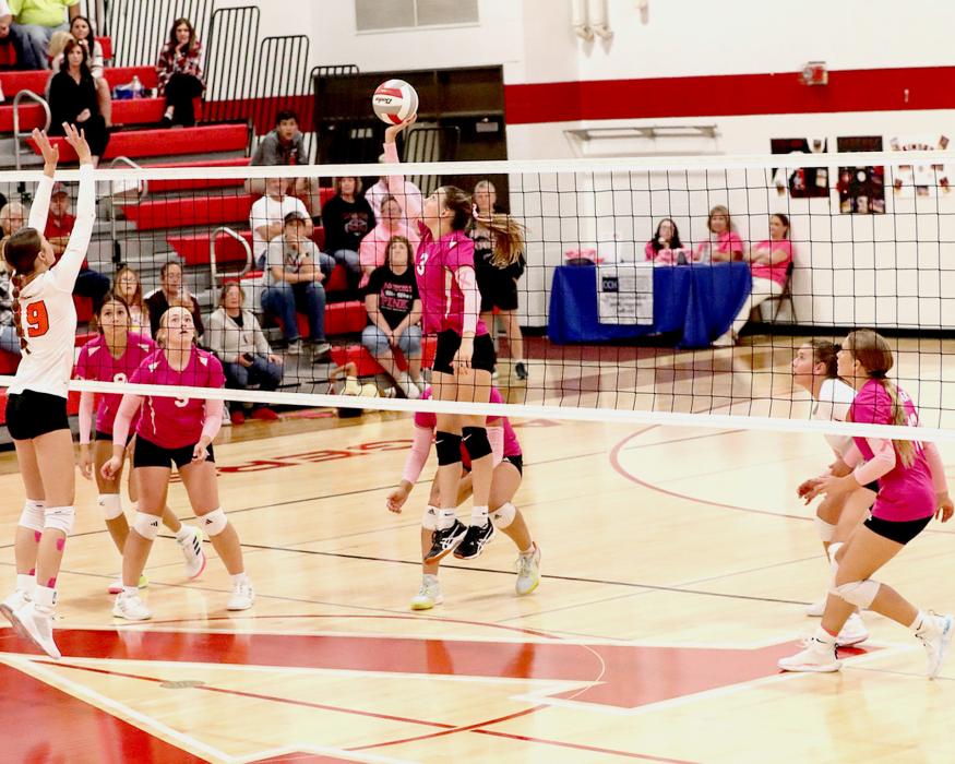 Clarrah Beebout #3 at the net in the match against Cody-Kilgore Cowgirls. Kate Cox #19 is ready to block the ball for the Cowgirls. The Lady Badgers won over the Cowgirls in two sets.